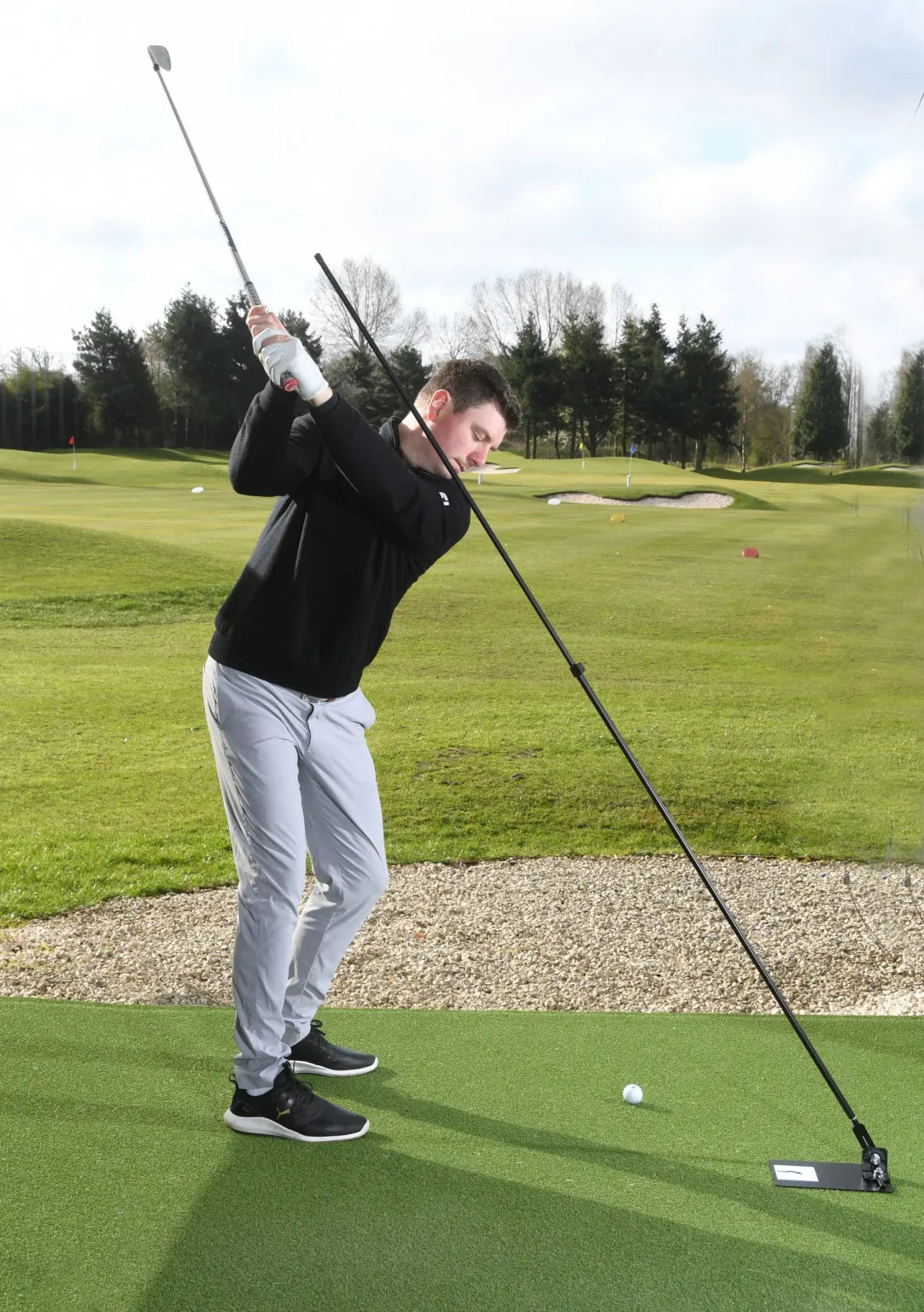 The Swing Plate with Extendable Twist Lock Golf Training Pole