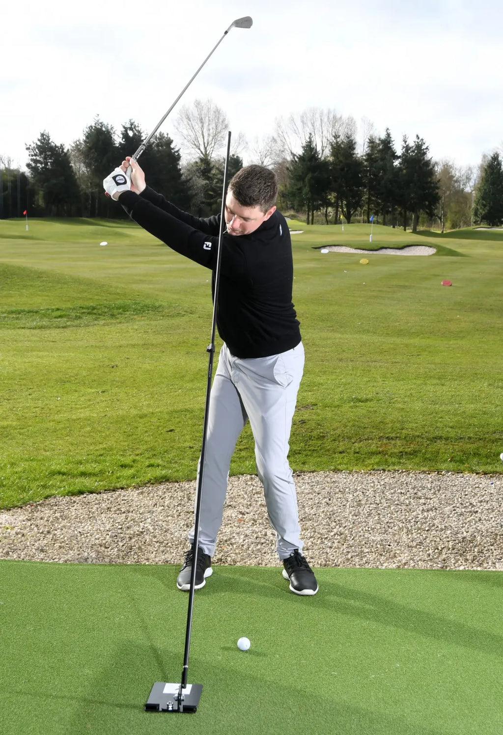 The Swing Plate with Extendable Twist Lock Golf Training Pole