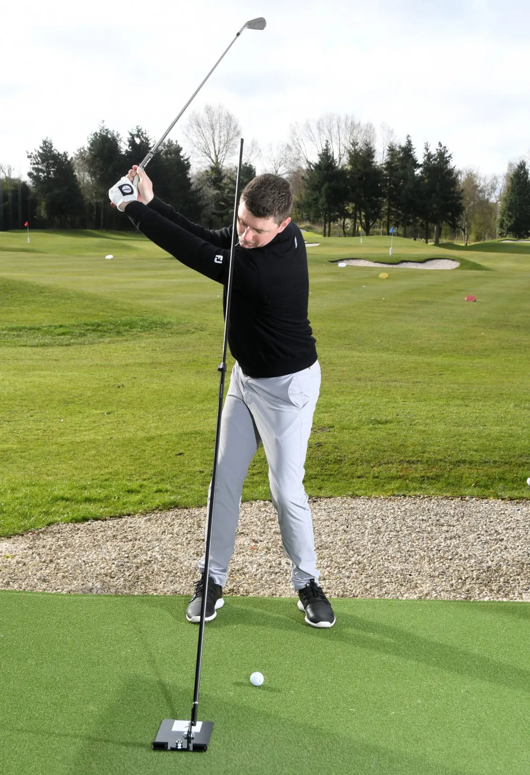 The Swing Plate with Extendable Twist Lock Golf Training Pole